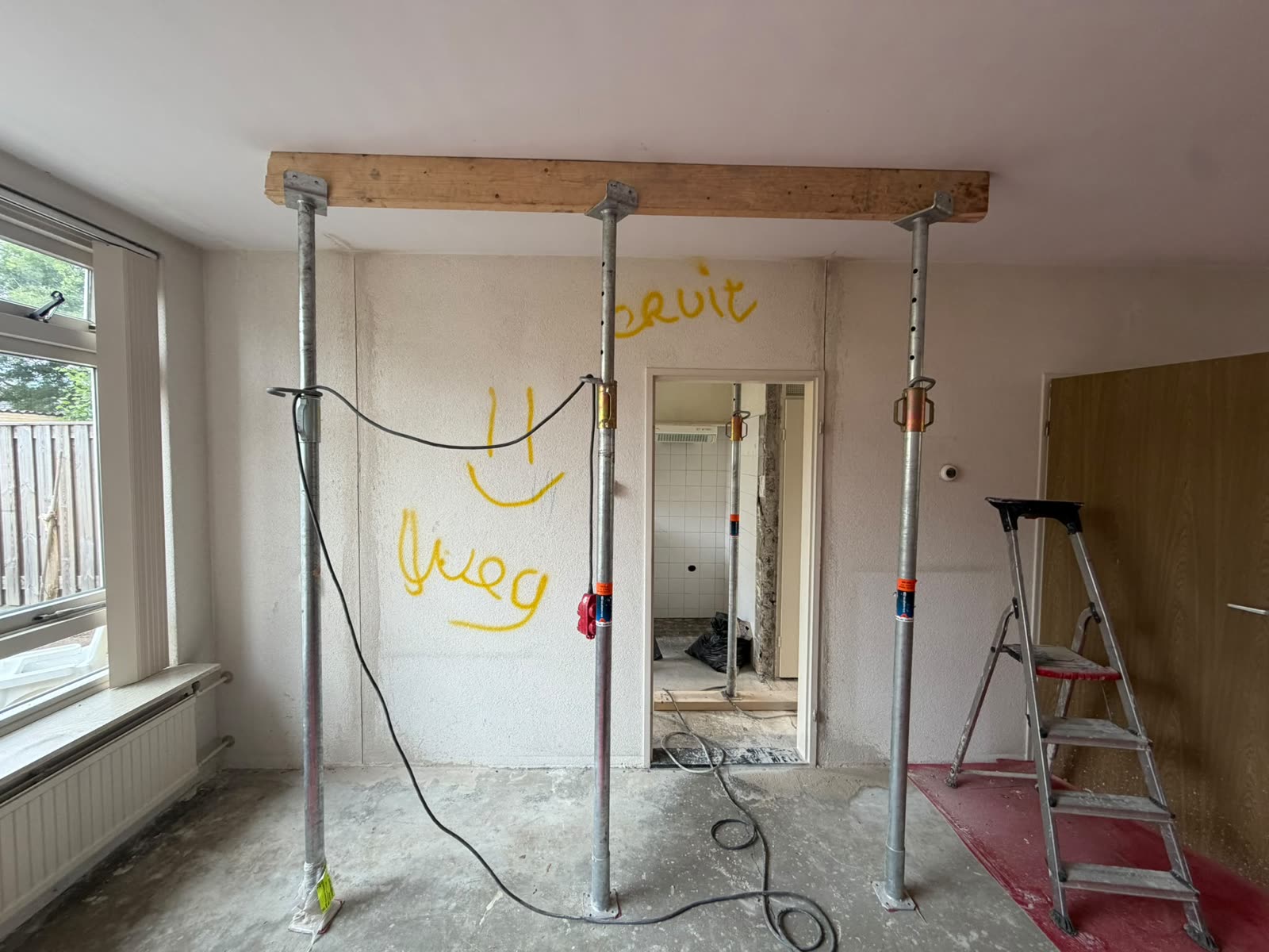Marked-up wall with propping frame