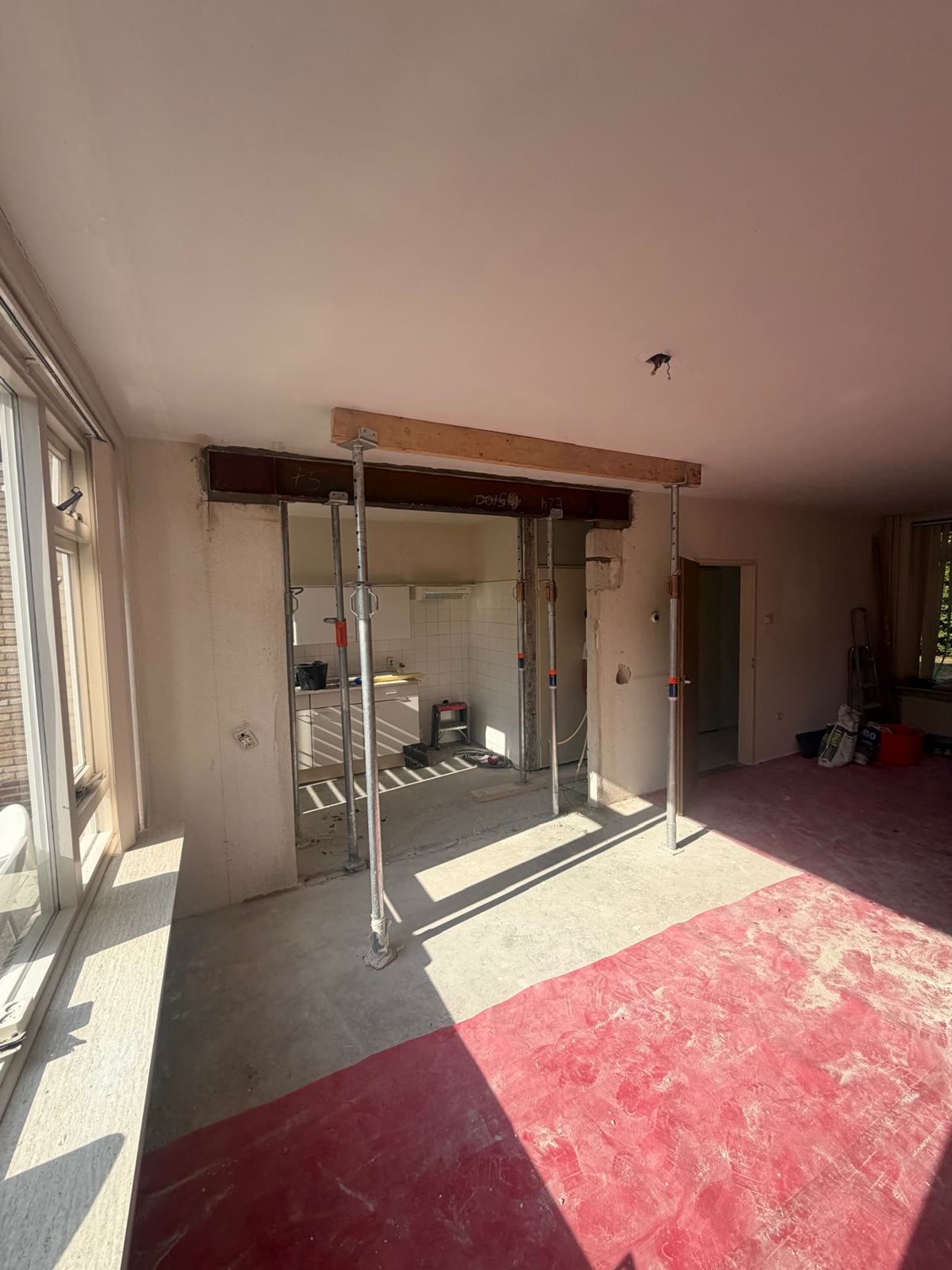 View of the living room with the beam in place